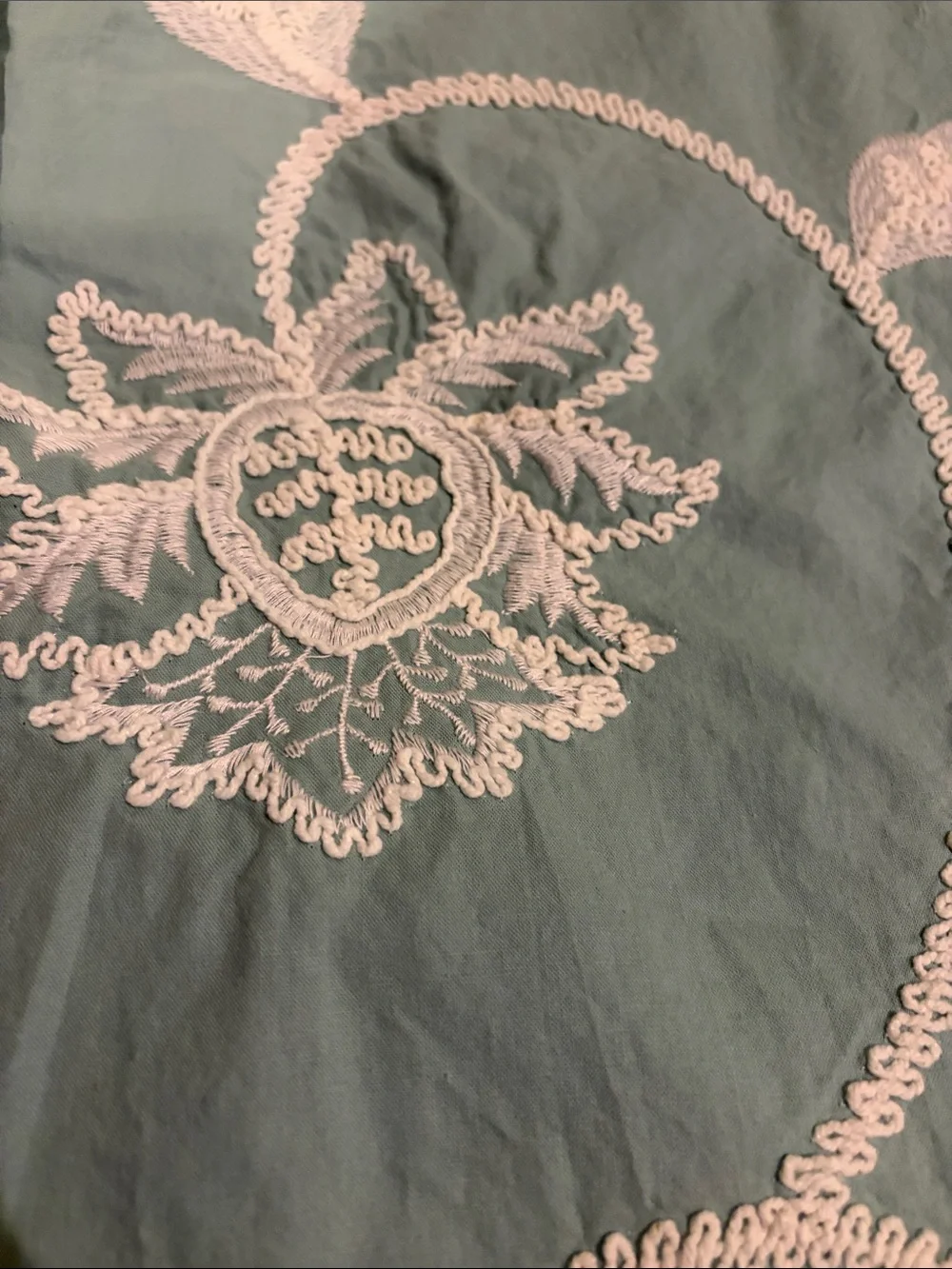 Beautiful Turquoise table runner with white embroidered flower scroll